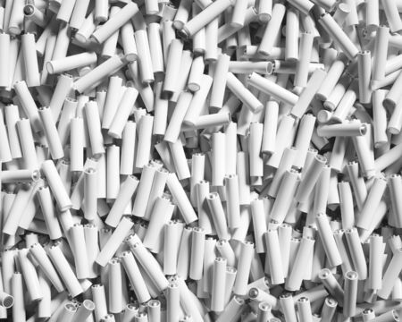 Bright white unlabelled AA batteries under bright studio lighting. Shot from aerial perspective....