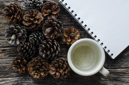 cup Coffee with Pine flower backgroundの写真素材