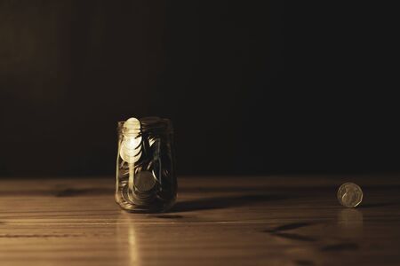 Saving money into bottle, Money save concept