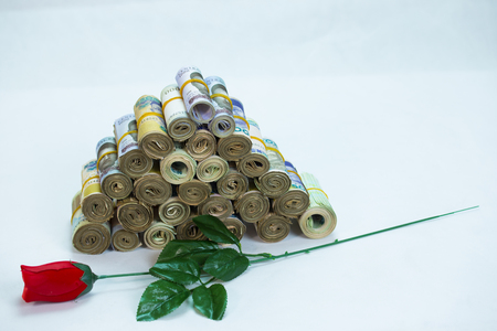 Rolls and Bundles of Naira Cash local currencies in a pyramid heapの写真素材