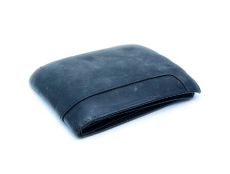 Old dirty black walletの写真素材