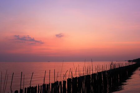 Sunset in lonely seaの写真素材