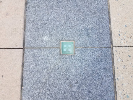 light in the ground on black surfaceの写真素材