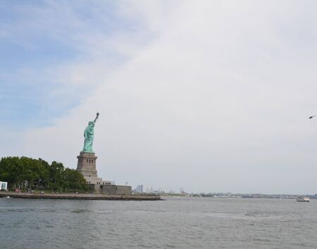 statue of liberty monument and river water in New York city