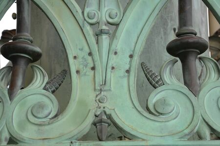 close up of intricate curved copper metal details