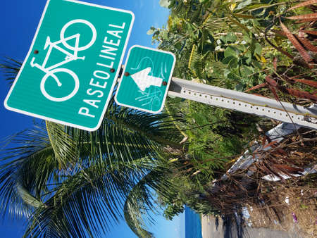 ocean and paseo lineal or biking trail sign in Isabela, Puerto Ricoの写真素材