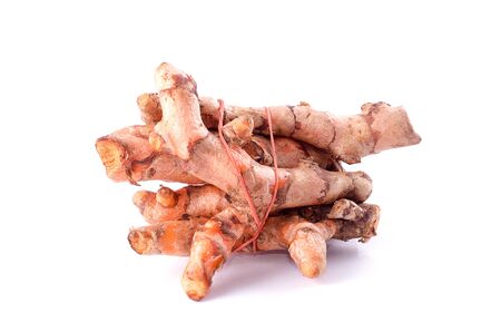 bundle together turmeric root isolated on white background.This has clipping path for Design