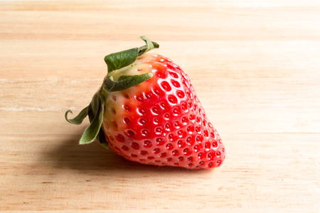 fresh strawberry on wood backgroundの写真素材