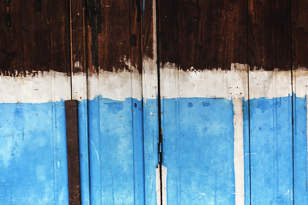 old, grunge wood panels used as backgroundの写真素材