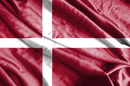 Waving flag of Denmark. Flag has real fabric texture.の写真素材