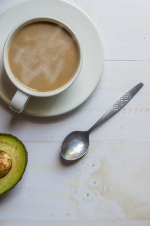 Pink whole wheat bread with espresso coffee on white woodle.の写真素材