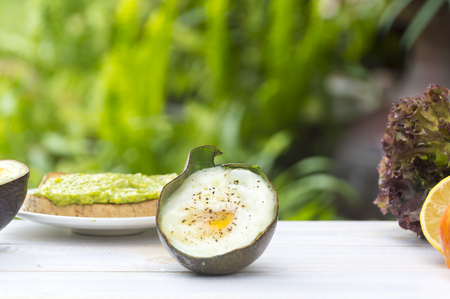 Healthy food. Vegan sandwiches with fresh avocado on wooden background,Close up egg.の写真素材
