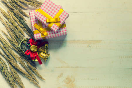 Christmas gift box. Christmas present in box at white wooden table. Flat lay with copy space.Vintage...