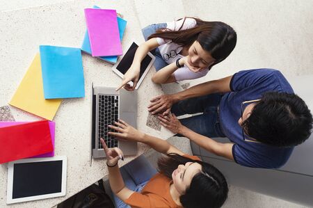 Group of young asian studying in university sitting during lecture education students college university studying youth campus friendship teenager teens concept.の写真素材