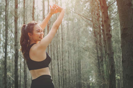 Asian women fitness woman runner stretching legs,Happy enjoying freedom active healthy lifestyle...