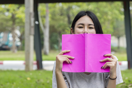 Asian female education, campus, friendship and people concept group of happy teenage students with...