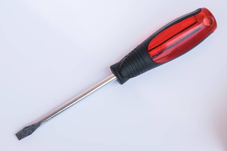 Standard cabinet tip screwdriver, tool for turning  screws, isolated on white background