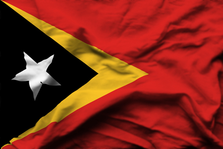 East Timor 3D wrinkled flag illustration. Usable for background and texture.の写真素材