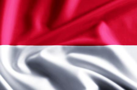 Monaco 3D waving and closeup flag illustration with reflections. Usable for background and texture.の写真素材
