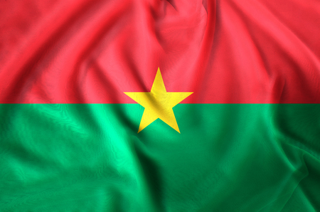 Burkina Faso modern and realistic closeup flag illustration. Perfect for background or texture purposes.の写真素材