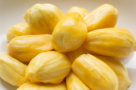 Fresh ripe Jackfruit ready to eat in white plate with isolated on white background.