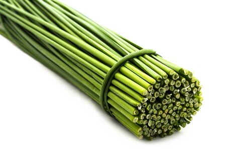 Chives flower or Chinese chive isolated on white backgroundの写真素材