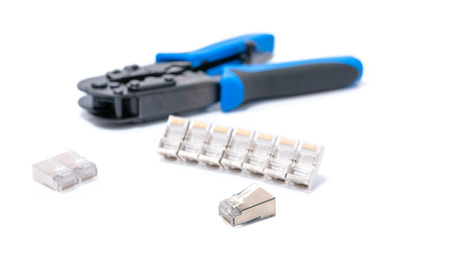 Crimping tool isolated on white background, use for twisted pair network cable with handful of RJ-45 connector.の写真素材