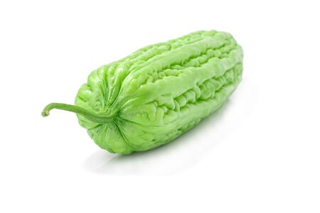 Bitter gourd or bitter melon, balsam pear, cucumber isolated on a white background. Horizontal, Selective focus.の写真素材
