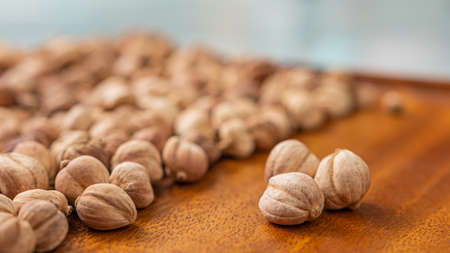 Close-up photo image for a group of dry cardamom with copy space for text. Selective focus.