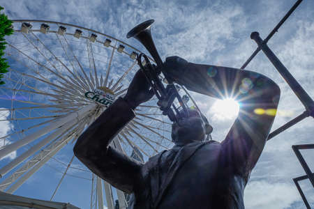 Bangkok, Thailand - August 04, 2021: The sculpture statue with ferris wheel of background in Asiatique The Riverfront, Bangkok, Thailandのeditorial素材