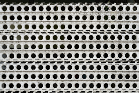 Perforated metal fence, Yangon, Myanmarの写真素材