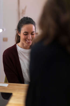 A female patient talks to her therapist