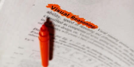 Visual reasoning mathematical terminology presented on book text highlighted pattern on educational background.の写真素材