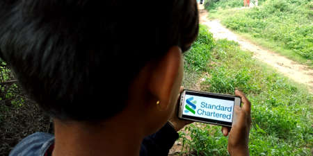 DISTRICT KATNI, INDIA - SEPTEMBER 18, 2019: Standard Chartered Financial services company logo...