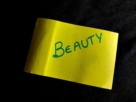 Beauty word displayed on paper slip concept for educational informative awareness.