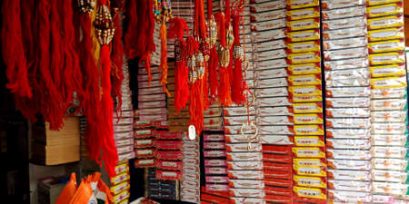 DISTRICT KATNI, INDIA - AUGUST 12, 2019: Beautiful traditional Rakhi displayed for sale demonstration during Raksha Bandhan hindu religious festival at rural market.のeditorial素材