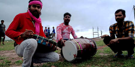 DISTRICT KATNI, INDIA - SEPTEMBER 12, 2019: Two Indian village drummer playing traditional music on...