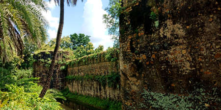 DISTRICT KATNI, INDIA - OCTOBER 10, 2019: Side wall water flowing view at ancient fort in Vijayraghavgarh fort was constructed by Thakur Prayag Das.のeditorial素材