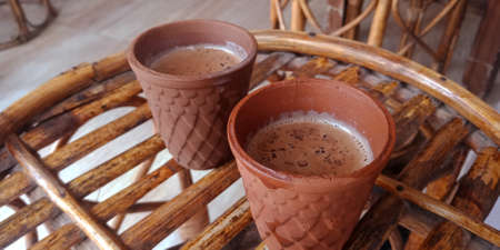 kulhad tea Closeup on wooden chair background.の写真素材
