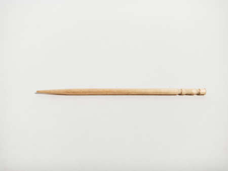 Single tooth pick stick isolated on white background for marketing and branding promotional purpose...