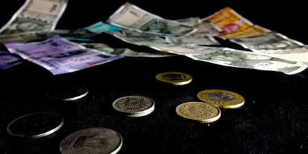 Indian currency five rupees coin on focus isolated on black background for financial marketing purpose.の写真素材