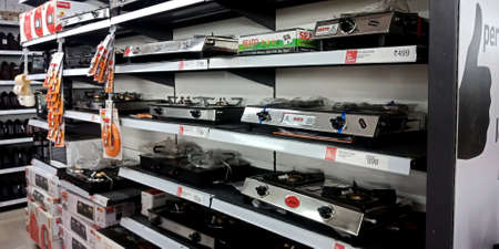 DISTRICT KATNI, INDIA - SEPTEMBER 16, 2019: Cooking LPG gas stove arrange at racks for selling product at mega mart store.のeditorial素材