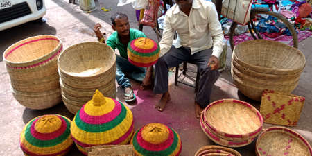 DISTRICT KATNI, INDIA - SEPTEMBER 24, 2019: The baskets presented for sale at indian festival bazaar season sale by village salesmen.のeditorial素材