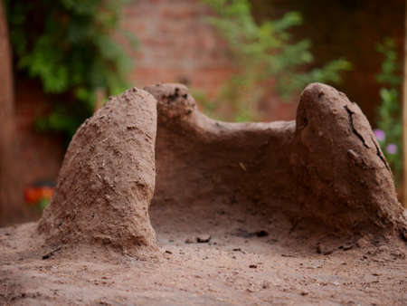 Isolated soil made fireplace called in hindi Childhood presented in blur natural background