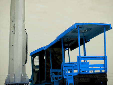 turquoise color kids train image on white sky behind the sceneの写真素材