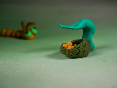 Birds eggs presented on scary background with blur creature on side top left frameの写真素材