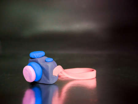 Beautiful clay camera isolate on silver backgroundの写真素材