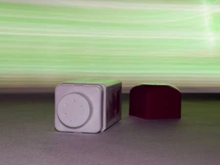 Health care Cosmetic product displayed on light effect ray on backdrop.