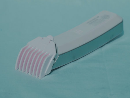 Hair trimmer electronic tool isolate on white plane background.