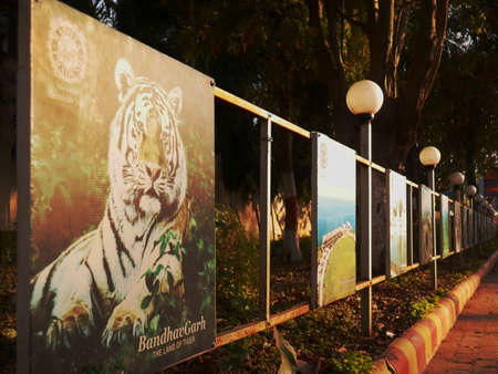 DISTRICT KATNI, INDIA - MARCH 02, 2022: Madhya pradesh tourism sign board displayed at garden background at day time.のeditorial素材